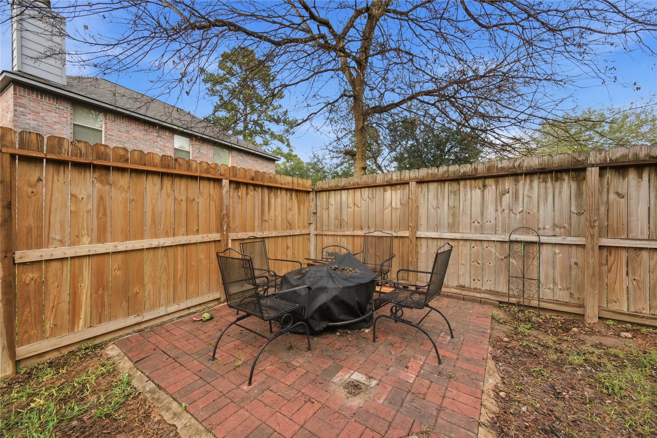 13506 Spring Court Tomball, TX 77375 - Photo 25 of 30 a view of backyard with outdoor seating