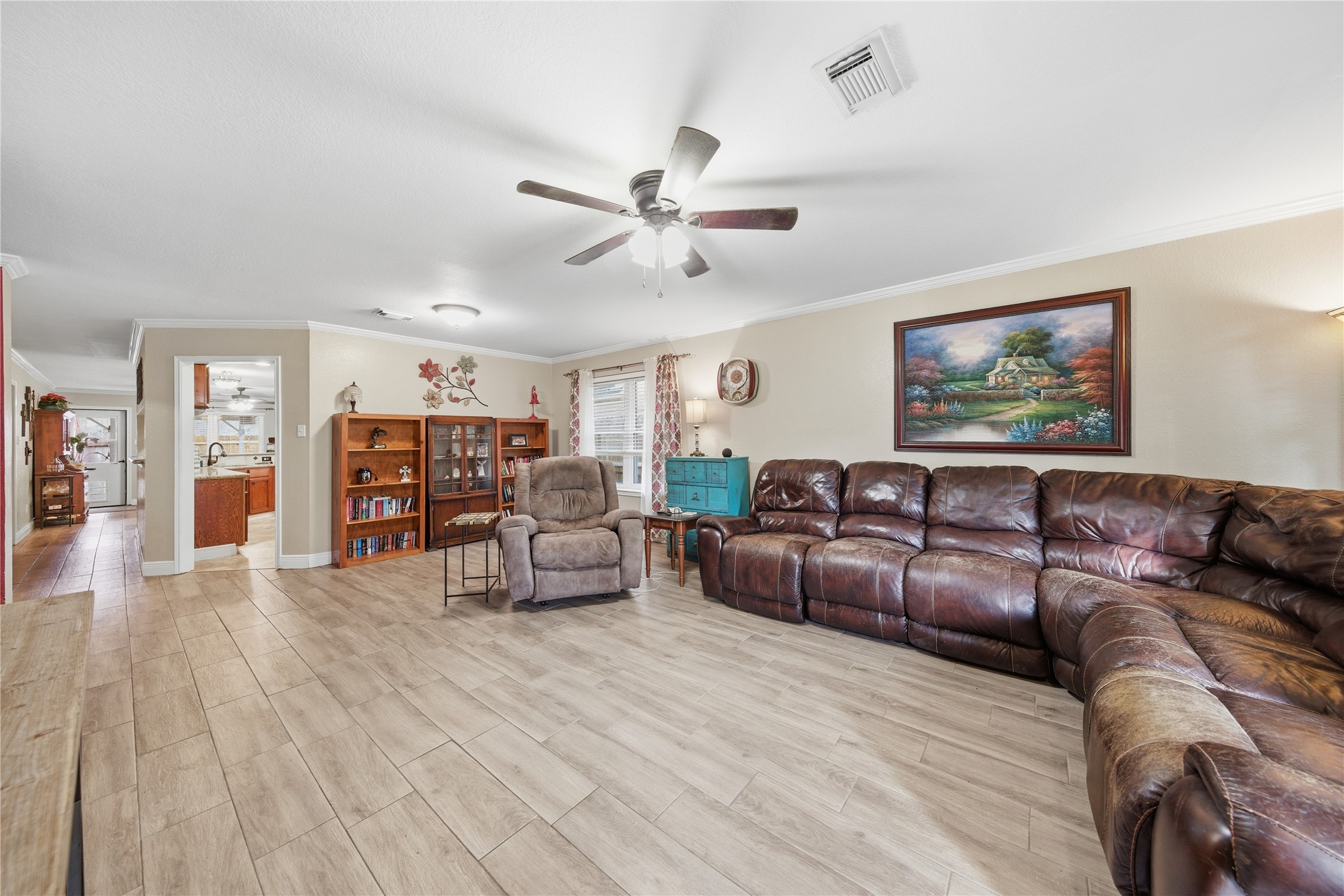 13506 Spring Court Tomball, TX 77375 - Photo 4 of 30 a living room with furniture and hard wood flooring
