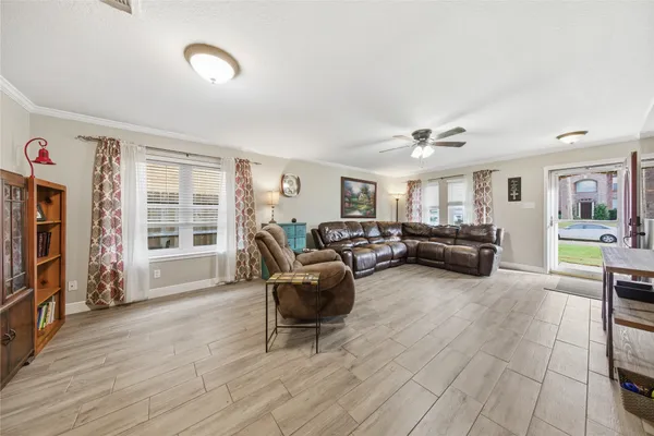 a living room with furniture and a window