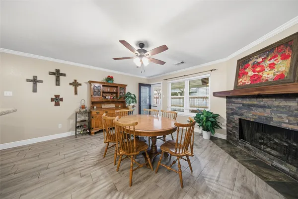 a view of a livingroom with furniture and a fireplace