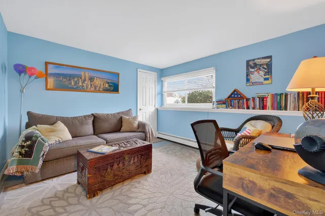 a bathroom with a sink mirror and vanity