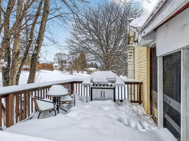 a view of a lake with a patio