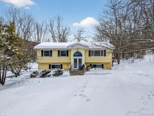 a view of snow on the side of road