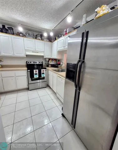 $98,750 | 2840 Somerset Drive, Unit 208M, Lauderdale Lakes, FL 33311