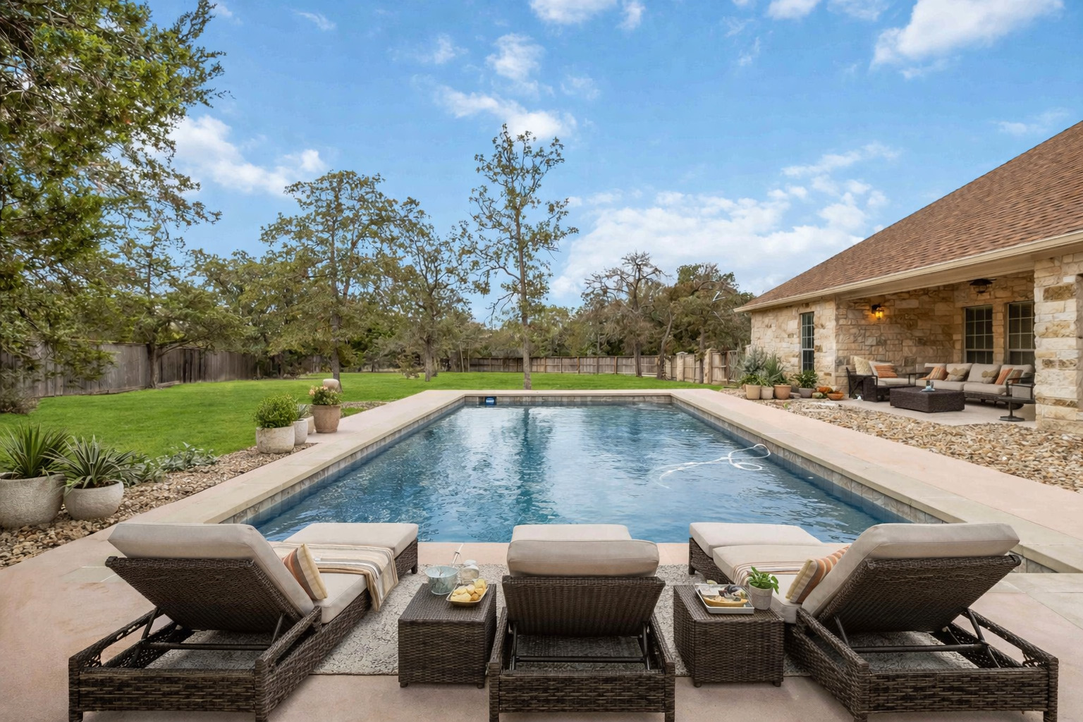 167 Winchester Road Bastrop, TX 78602 - Photo 2 of 34 View of swimming pool featuring outdoor lounge area, a fenced backyard, and a patio area
