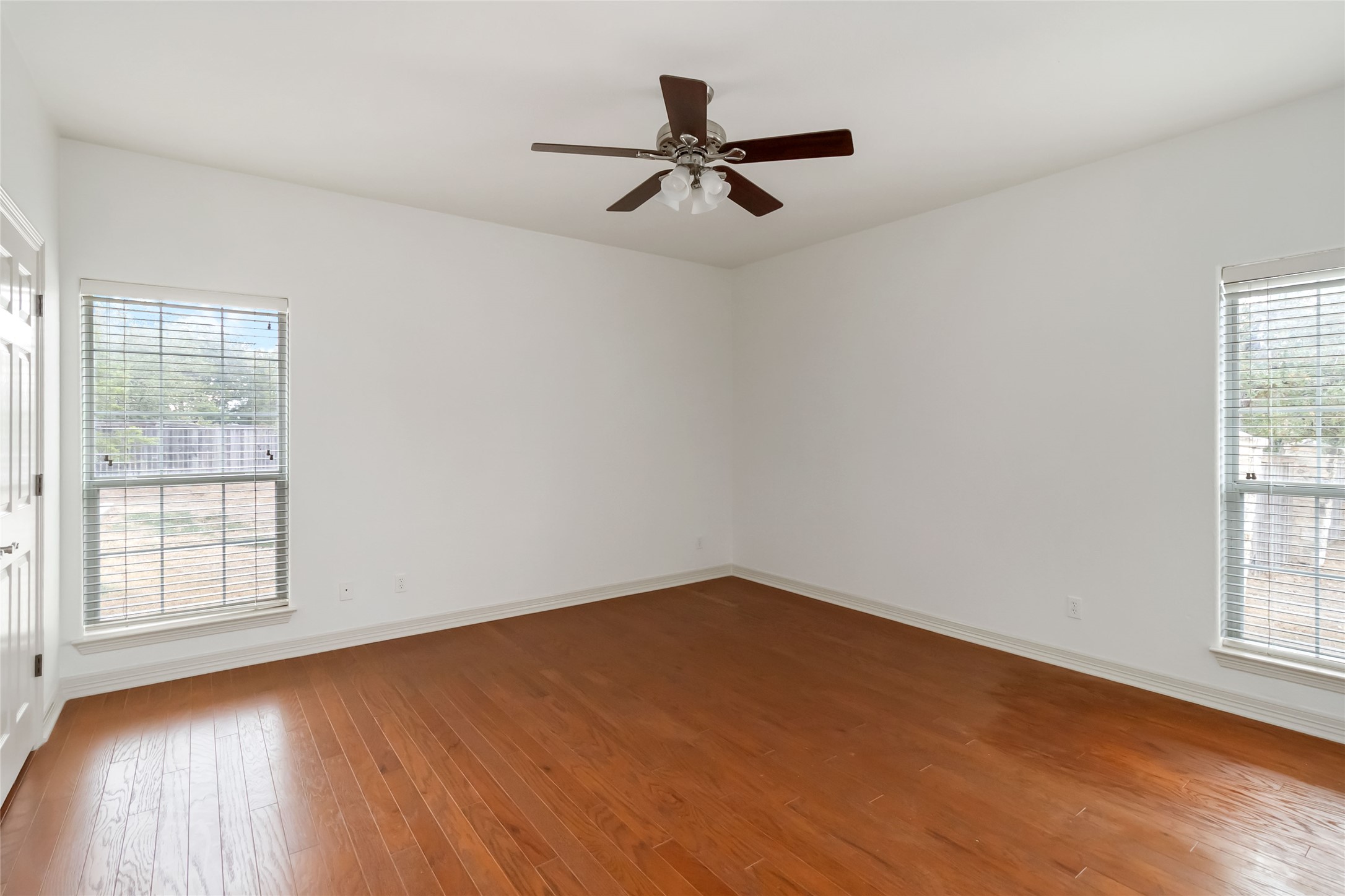 167 Winchester Road Bastrop, TX 78602 - Photo 26 of 34 Spare room featuring hardwood / wood-style flooring and ceiling fan