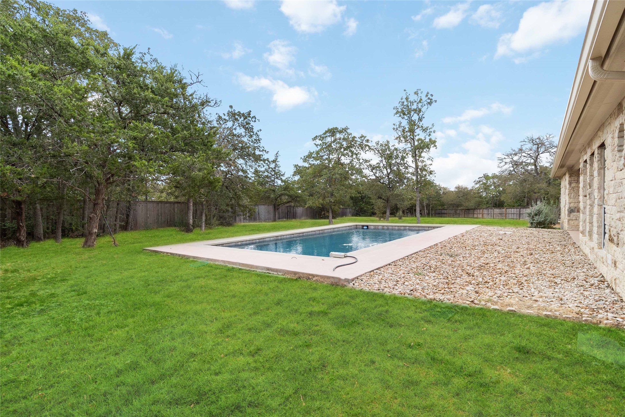 167 Winchester Road Bastrop, TX 78602 - Photo 30 of 34 View of pool with a fenced backyard and a patio area