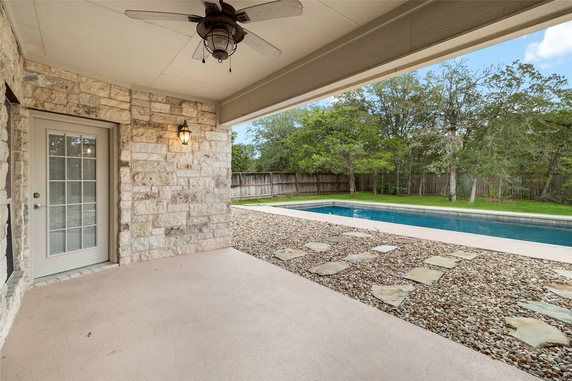 167 Winchester Road Bastrop, TX 78602 - Photo 33 of 34 View of pool featuring a fenced backyard, a patio, and ceiling fan