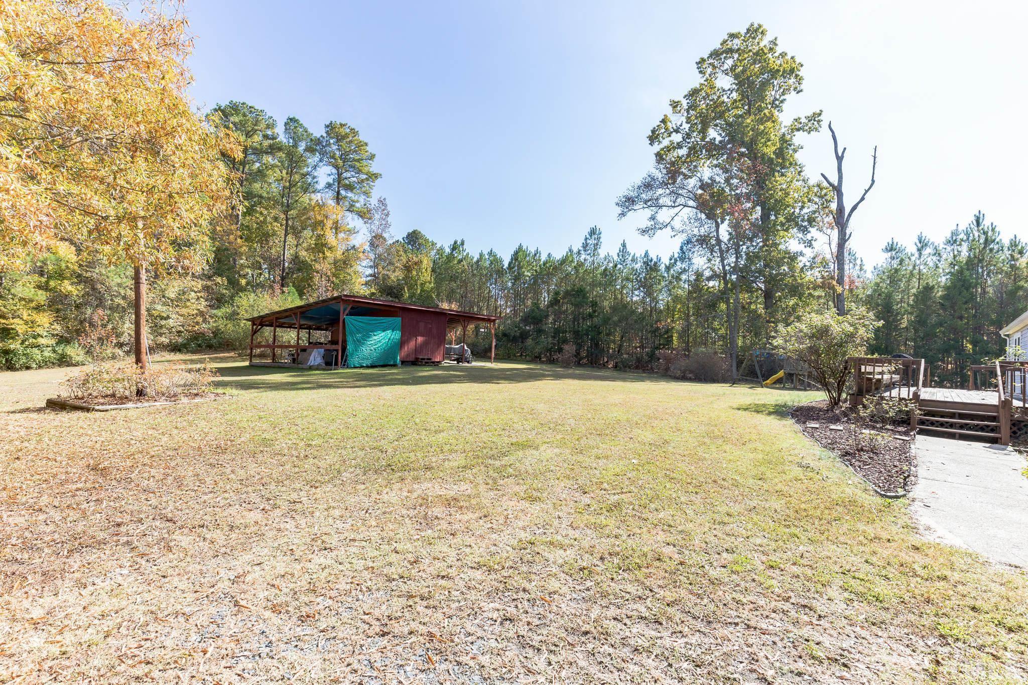 290 Thomas Cash Road Apex, NC 27523 - Photo 29 of 40 a view of swimming pool with chairs