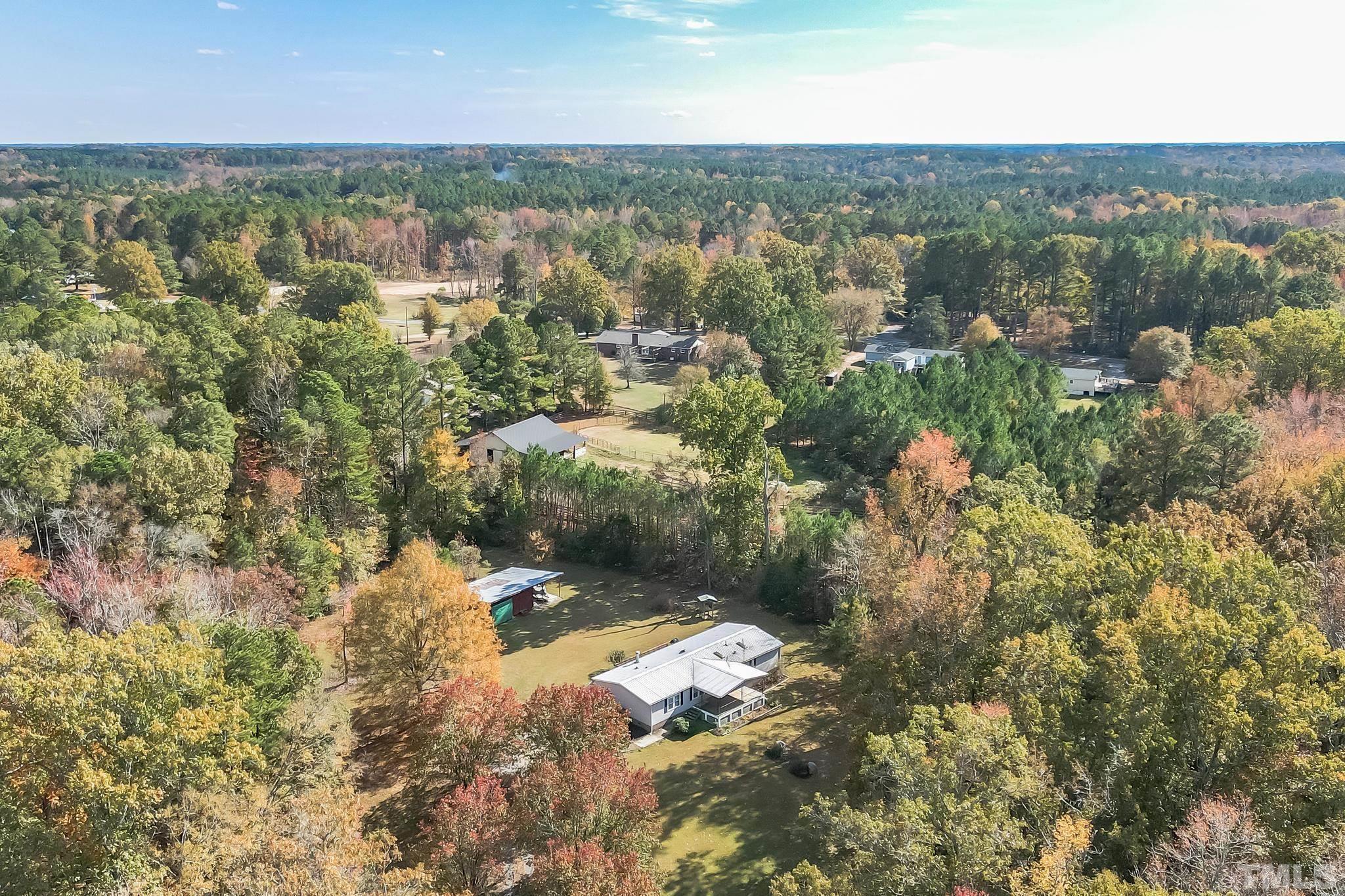290 Thomas Cash Road Apex, NC 27523 - Photo 5 of 40 an aerial view of residential house with outdoor space