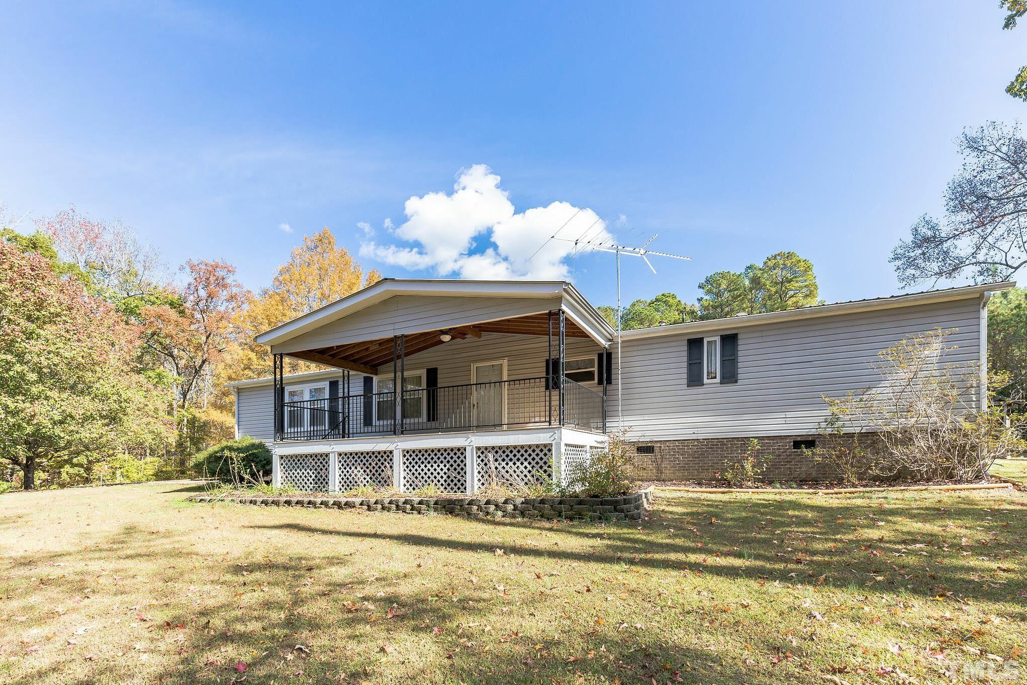 290 Thomas Cash Road Apex, NC 27523 - Photo 8 of 40 a front view of a house with a yard