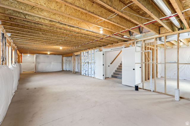 1144 South 4475 West West Point, UT 84015 - Photo 26 of 30 Unfinished basement with exposed ceiling joists and concrete flooring