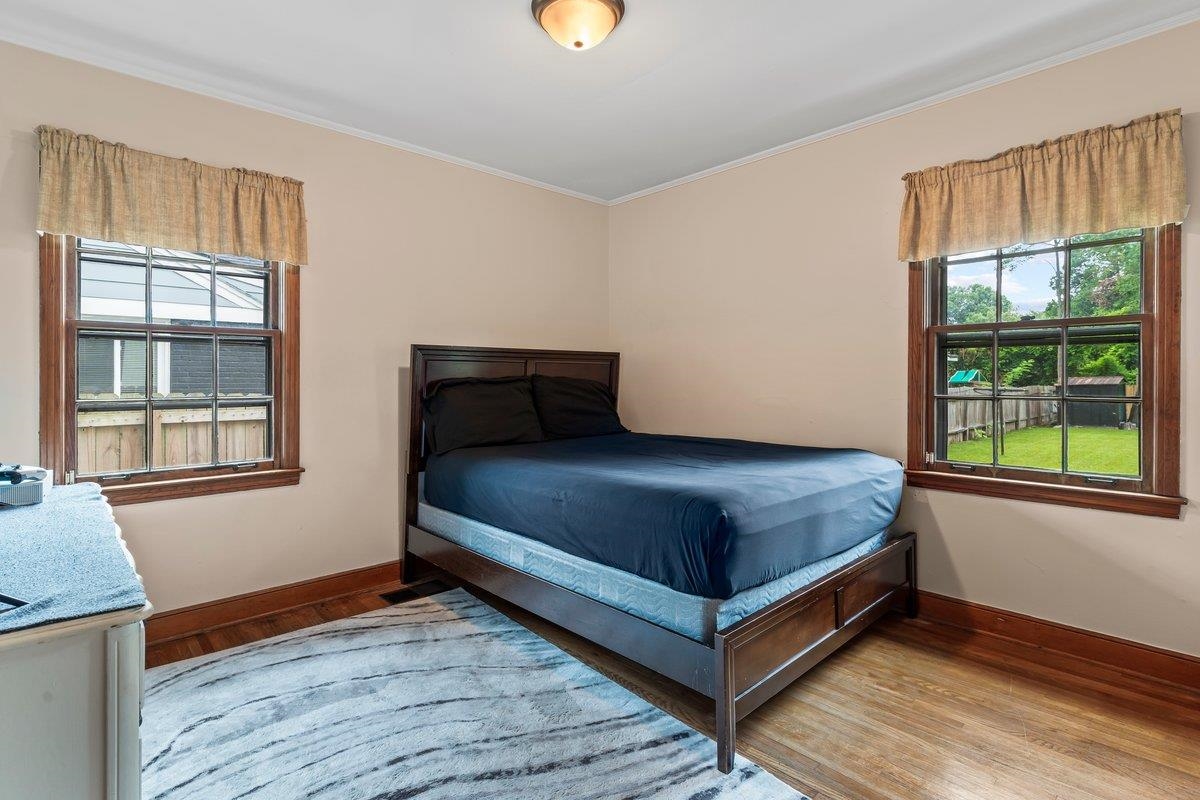 4740 Lynn Road Memphis, TN 38122 - Photo 13 of 25 a bedroom with a bed and window