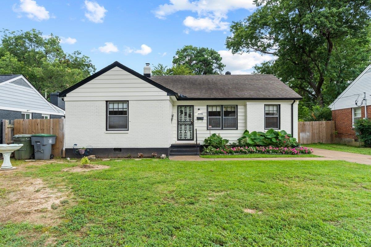 4740 Lynn Road Memphis, TN 38122 - Photo 2 of 25 a front view of house with yard and green space