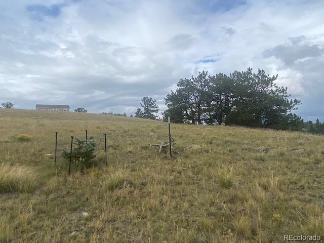 8518 Remington Road Como, CO 80432 - Photo 19 of 27 a view of a lake with houses in the back