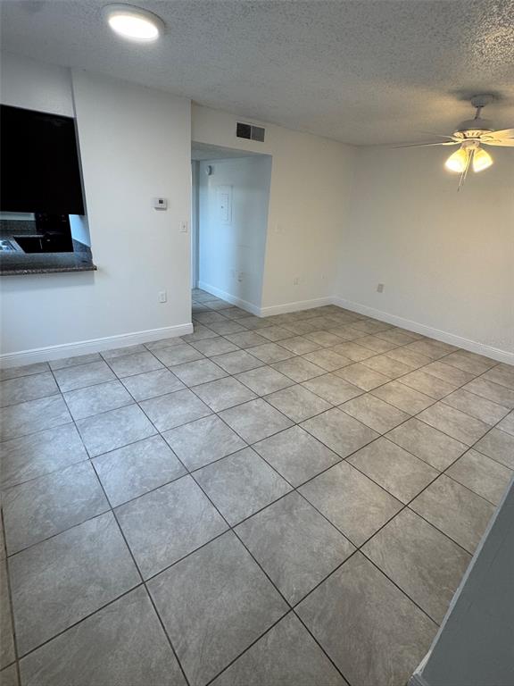 1189 Bentley Road, Unit 1 Leesburg, FL 34748 - Photo 3 of 10 a view of a livingroom with furniture and flat screen tv