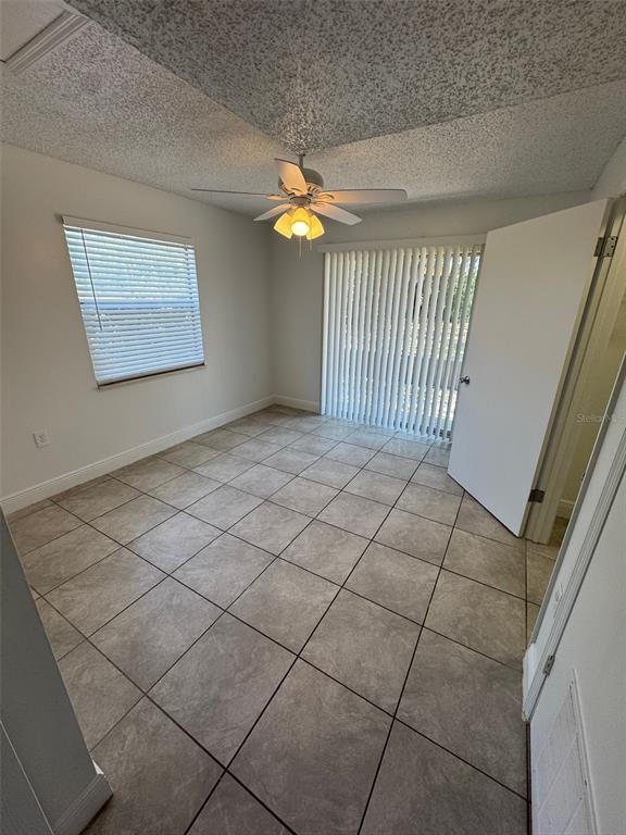 1189 Bentley Road, Unit 1 Leesburg, FL 34748 - Photo 6 of 10 a view of an empty room with a window