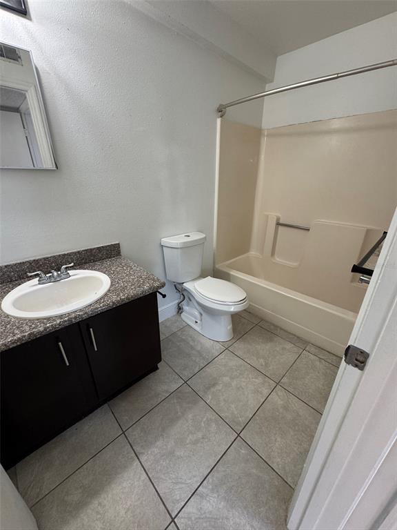 1189 Bentley Road, Unit 1 Leesburg, FL 34748 - Photo 10 of 10 a bathroom with a sink toilet and shower