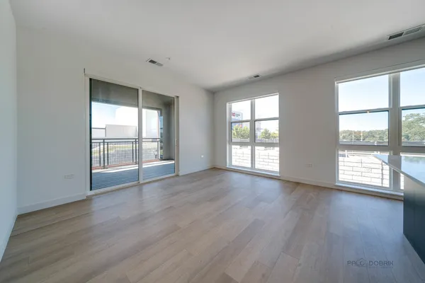 a kitchen with stainless steel appliances a refrigerator and a sink
