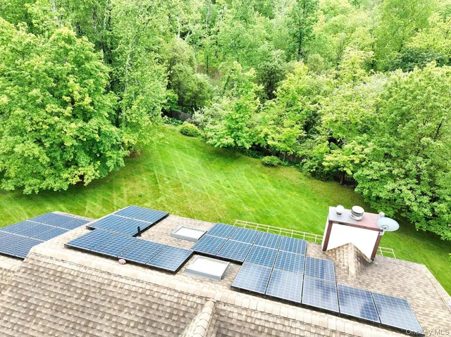 a view of a lake with a yard