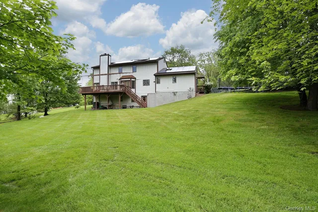 a view of a backyard with trees