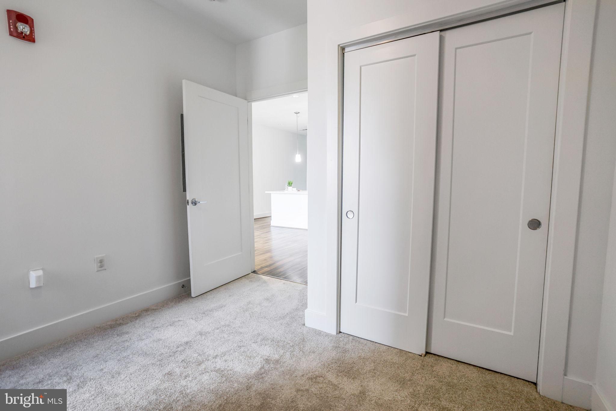 1111 Orren Street Northeast, Unit 310 Washington, DC 20002 - Photo 10 of 26 a view of an empty room