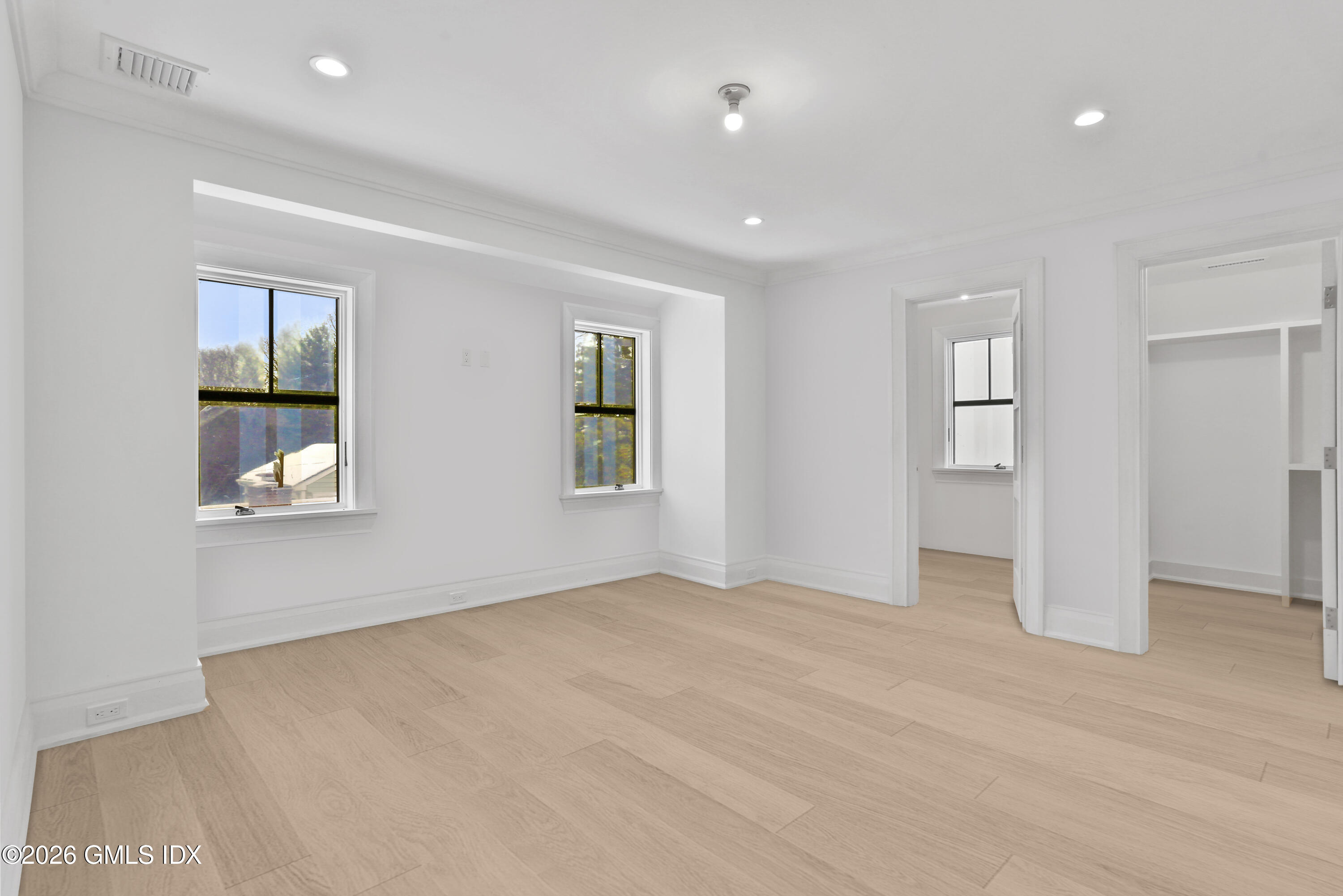 112 Sheep Hill Road Riverside, CT 06878 - Photo 17 of 30 wooden floor in an empty room with a window
