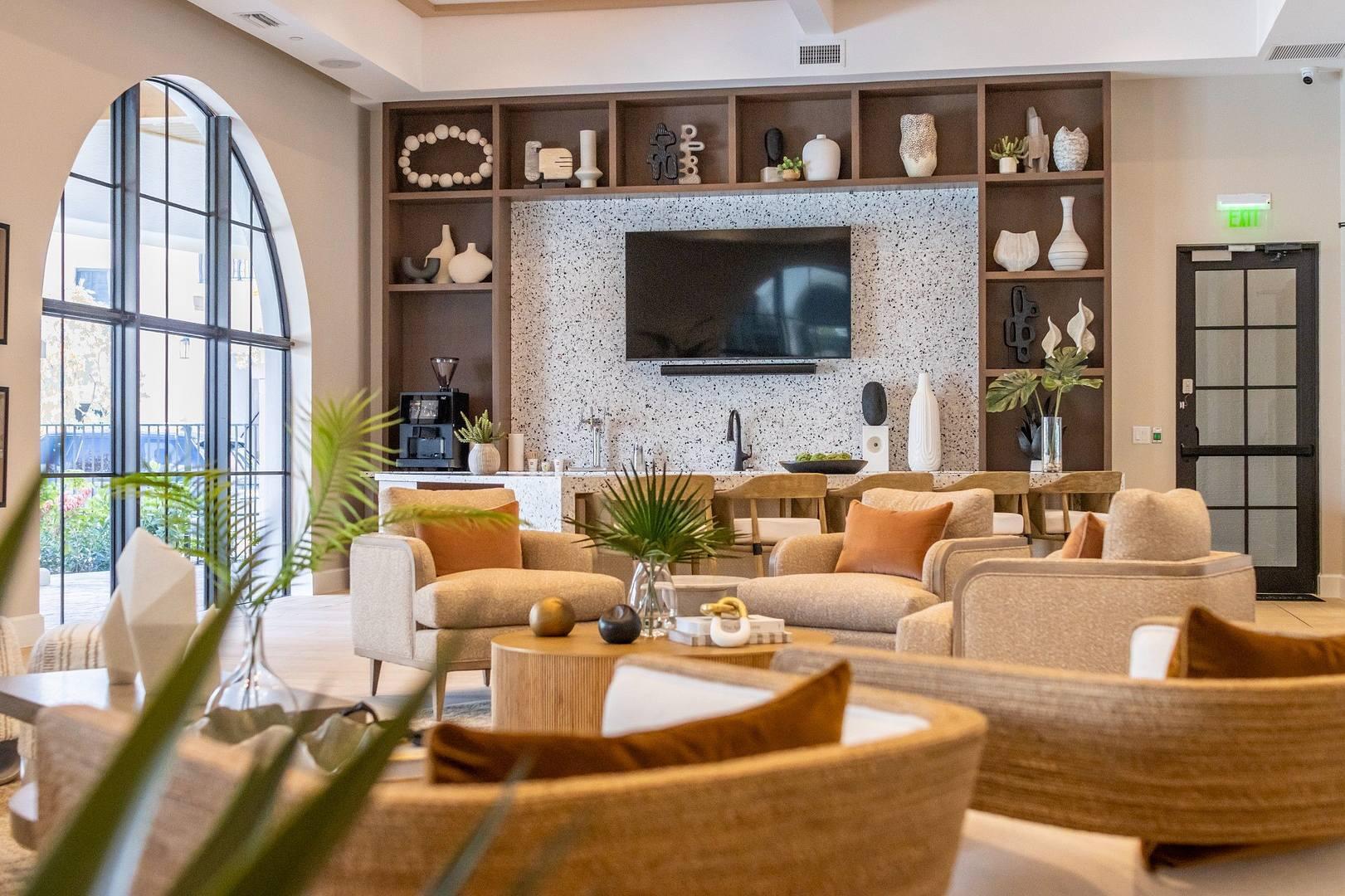 11270 Channing Way, Unit 104 Royal Palm Beach, FL 33414 - Photo 23 of 24 a living room with fireplace furniture and a flat screen tv