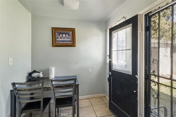 a kitchen with a sink a refrigerator and a stove