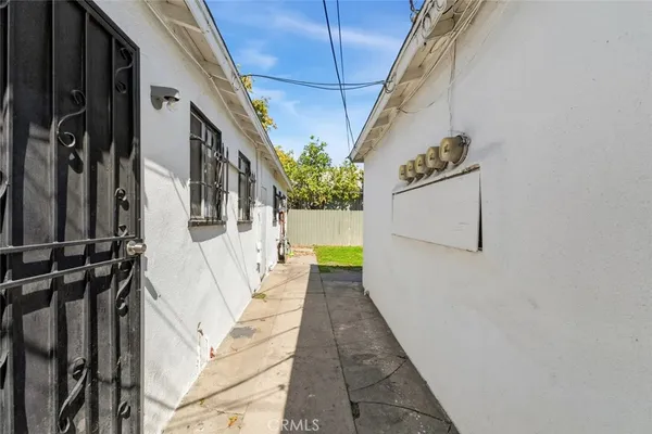 a view of a house with a yard and garage