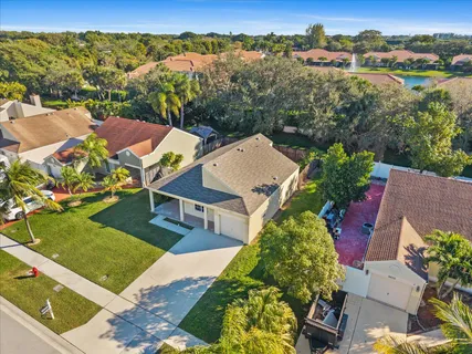 an aerial view of a house with a garden
