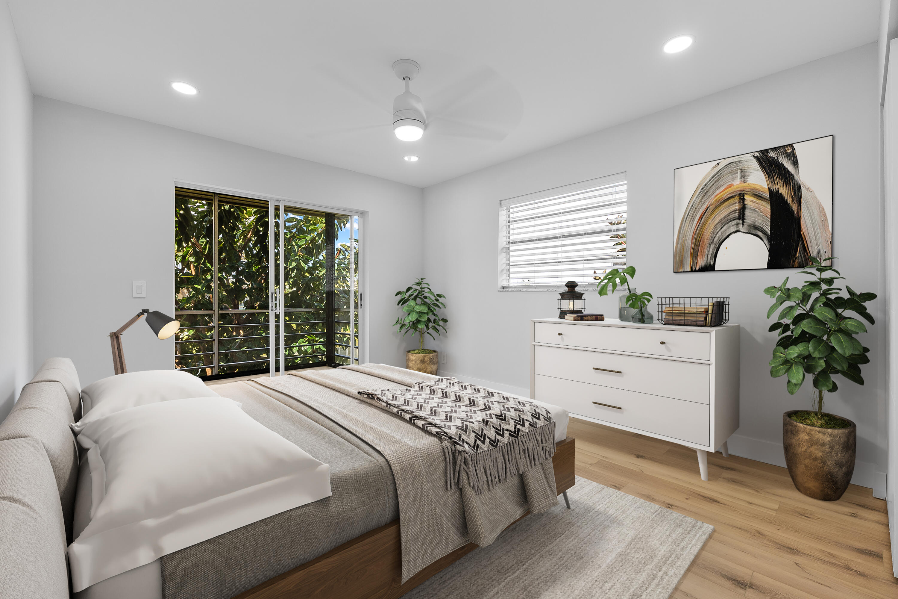 314 Monaco Boulevard, Unit G Delray Beach, FL 33446 - Photo 15 of 26 a bedroom with a bed potted plant and a window