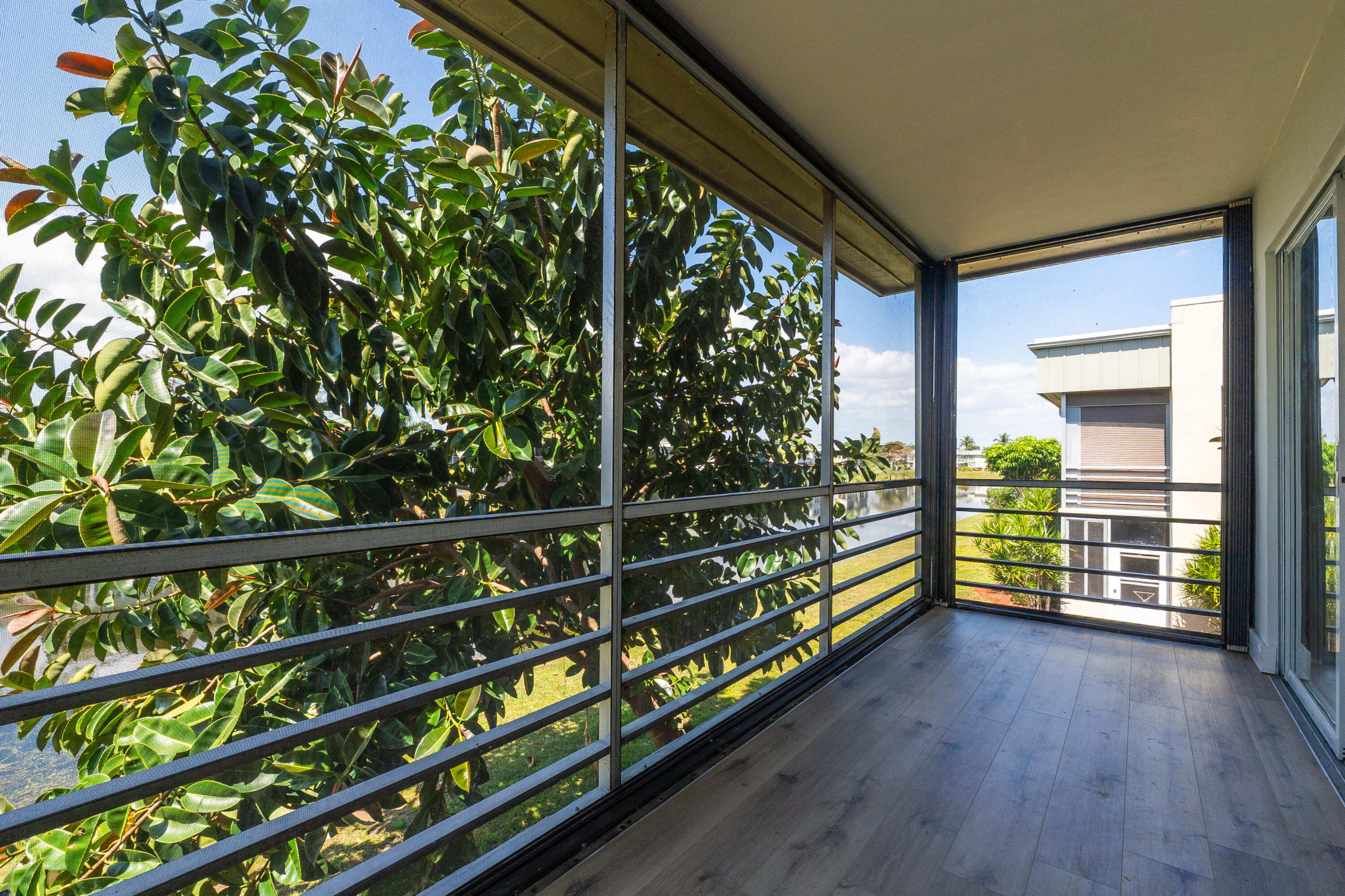 314 Monaco Boulevard, Unit G Delray Beach, FL 33446 - Photo 22 of 26 a view of outdoor space with seating area