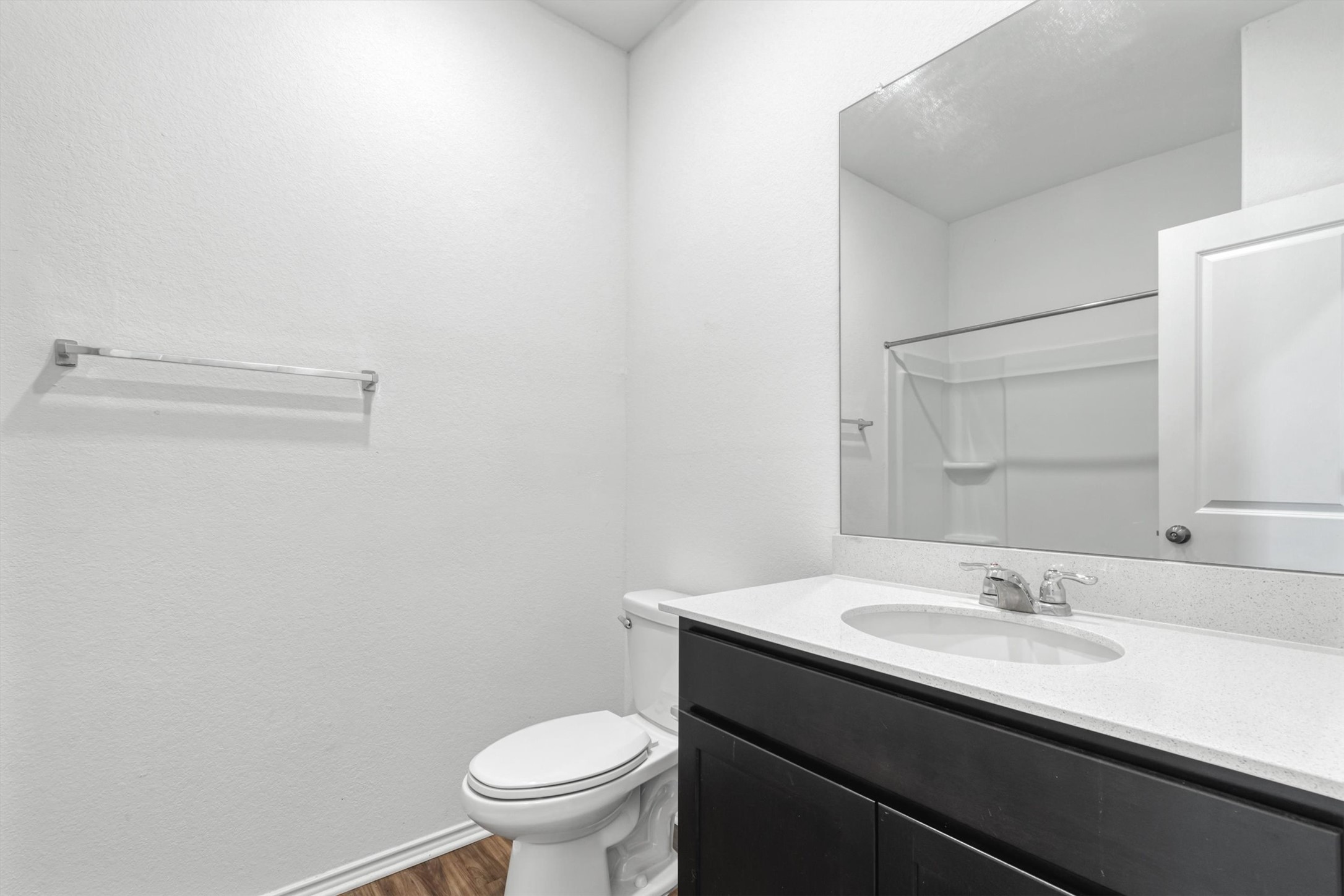 417 Soapstone Pass Maxwell, TX 78656 - Photo 13 of 18 a bathroom with a sink a toilet and a mirror