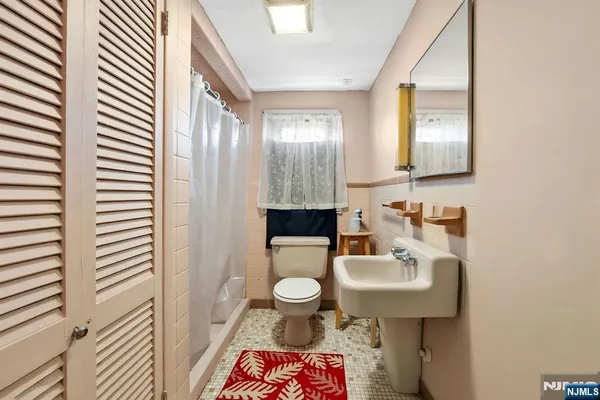 a view of a hallway with front door