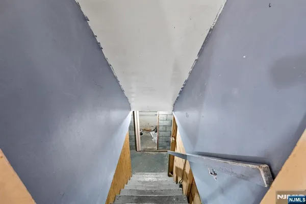 a view of a storage room with racks