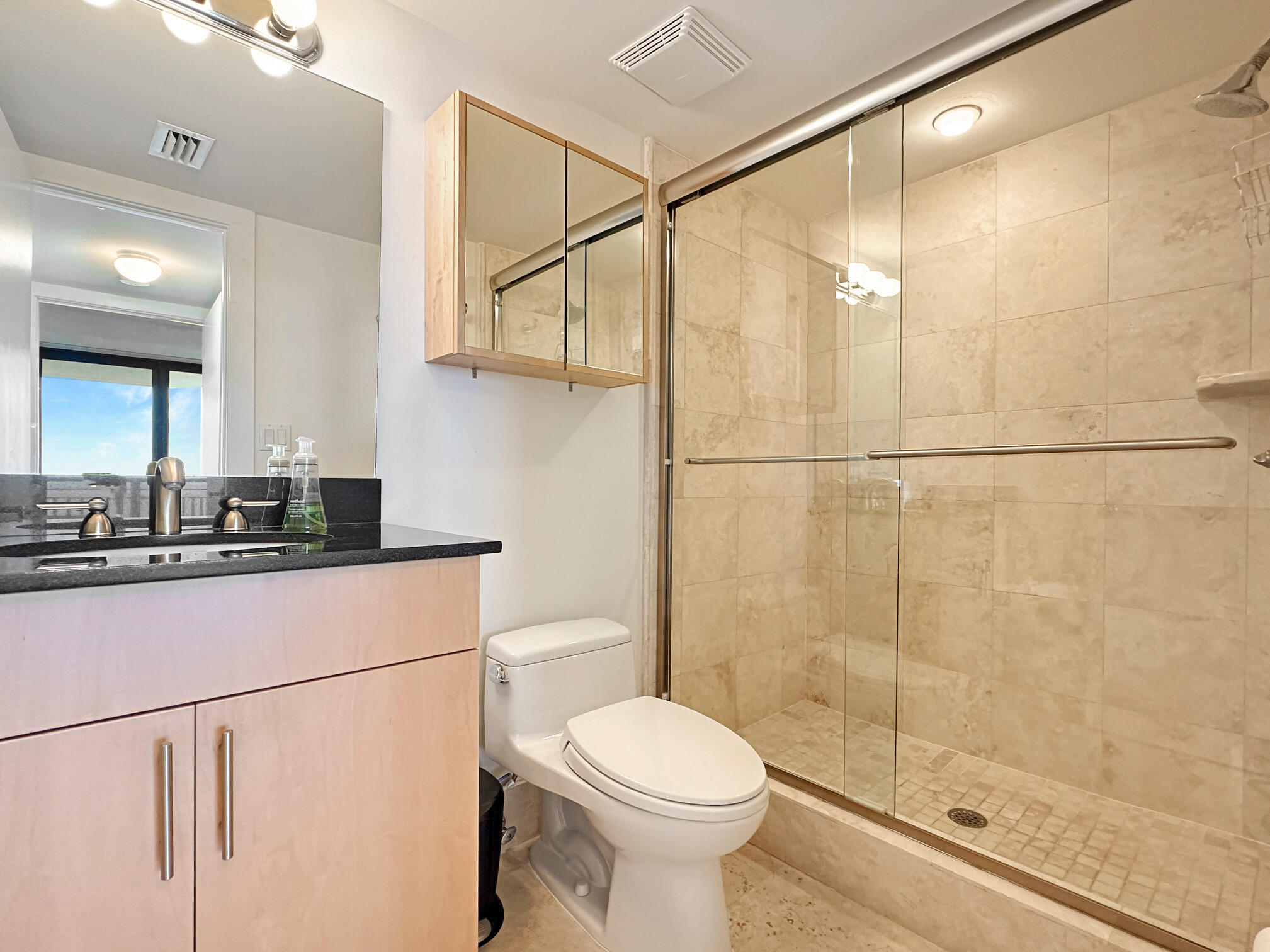 3000 North Ocean Drive, Unit 22D Riviera Beach, FL 33404 - Photo 14 of 53 a bathroom with a sink toilet and shower