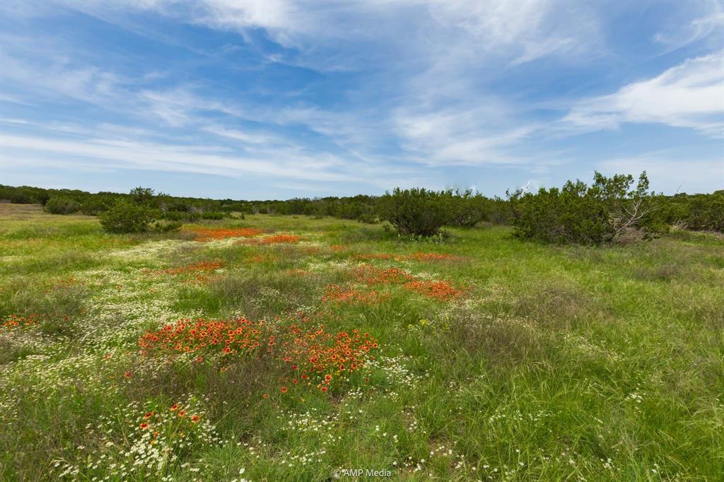 a view of an ocean and mountain