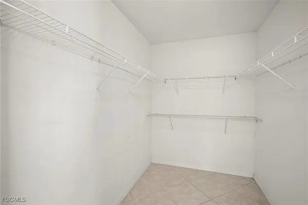 a view of a room with racks on the wall