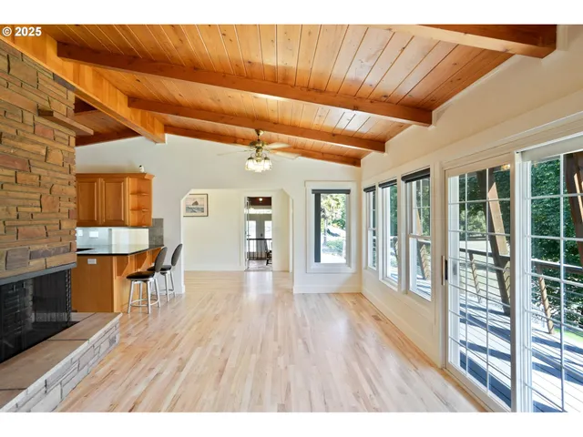 a room with furniture and wooden floor