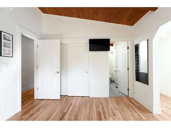 a view of front door and bedroom