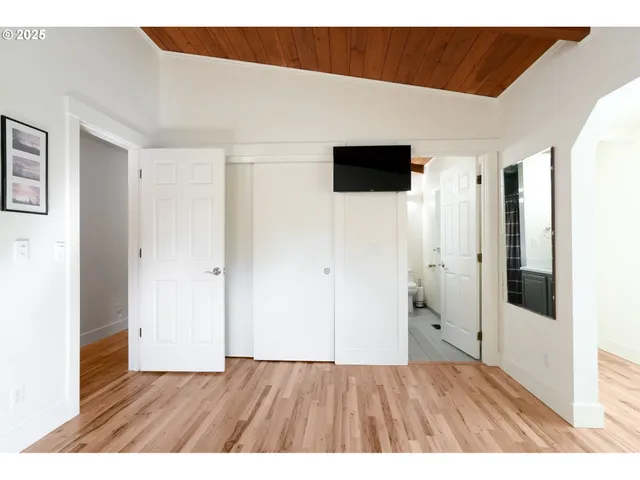 a view of front door and bedroom