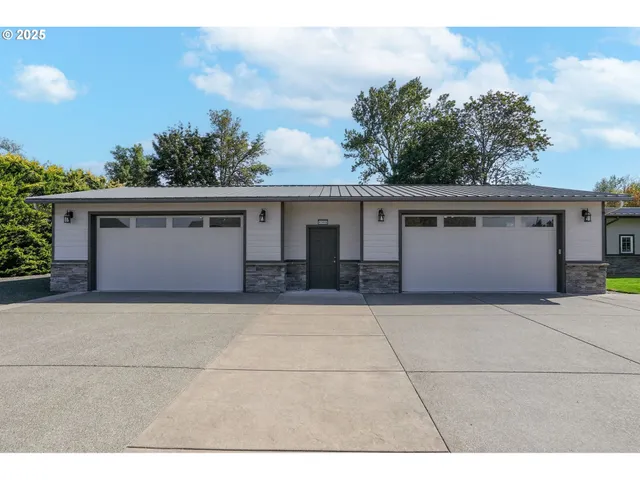 a view of house with yard
