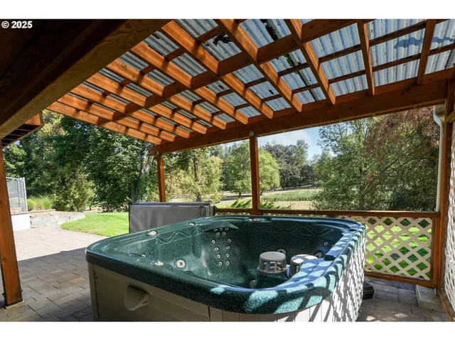 a view of a two chairs in the patio