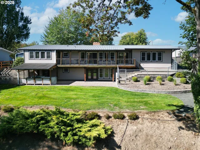 a house with garden in front of it