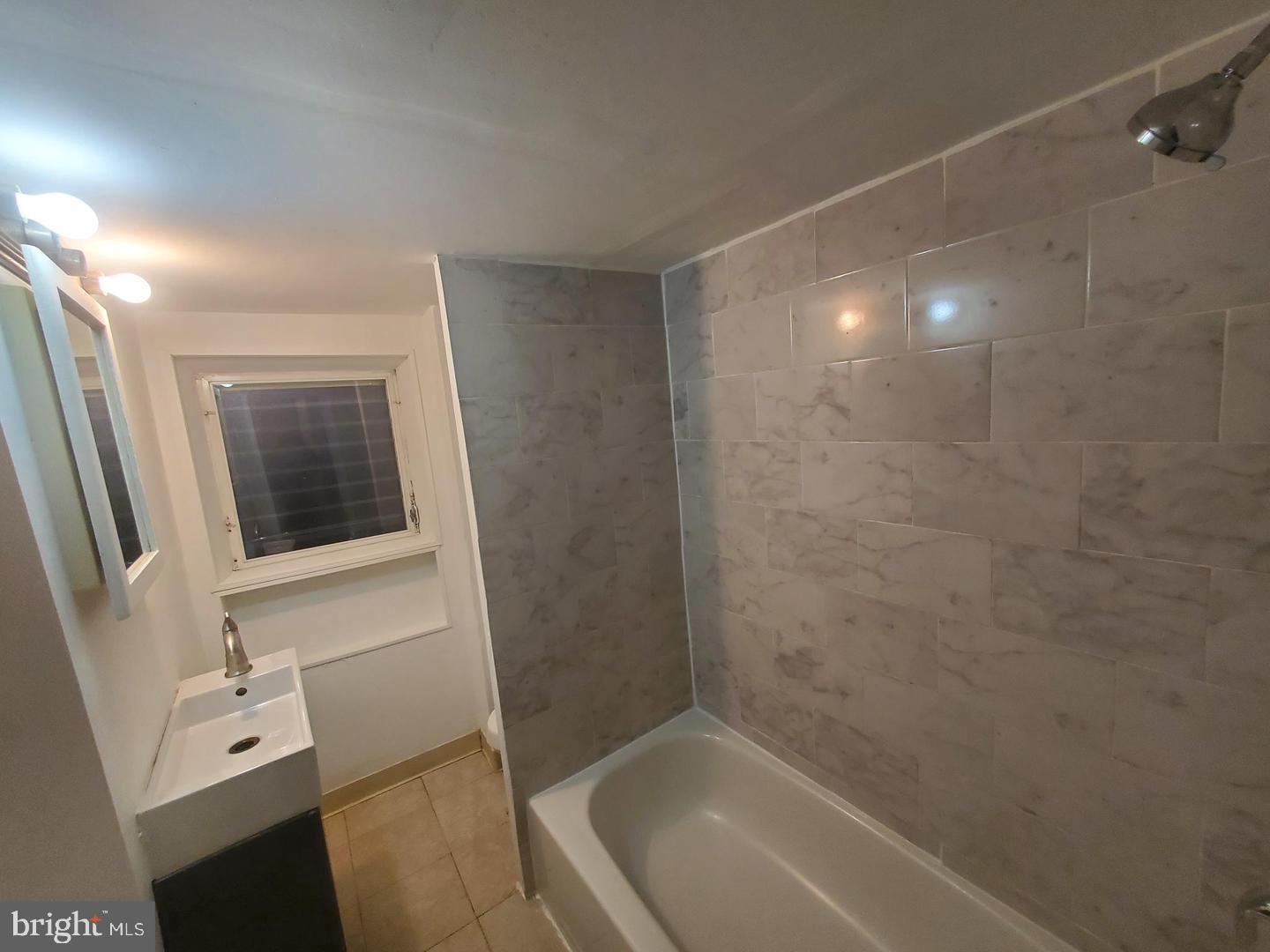 1 Old Ashton Road Philadelphia, PA 19152 - Photo 16 of 18 a bathroom with a bathtub and shower