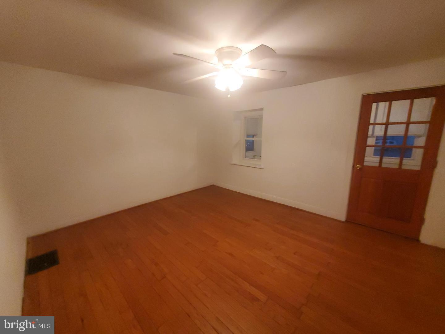 1 Old Ashton Road Philadelphia, PA 19152 - Photo 4 of 18 an empty room with windows and entrance