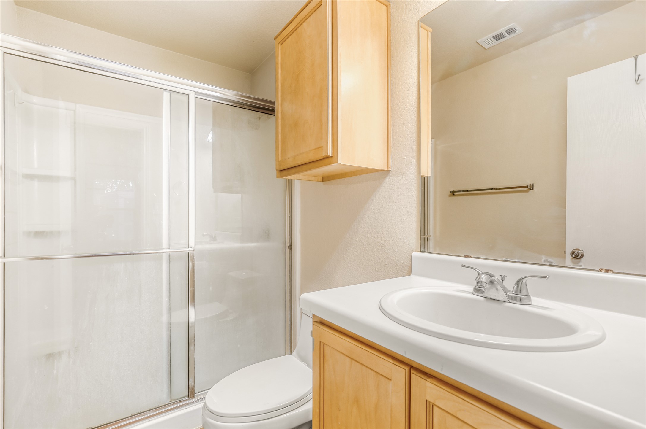 4620 Best Way Austin, TX 78725 - Photo 10 of 11 a bathroom with a sink toilet and shower