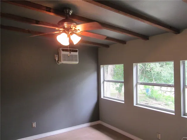 a view of a livingroom with a window