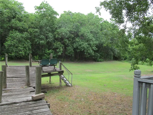 a garden view with a seating space